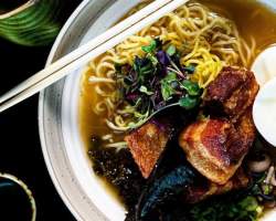 A bowl of Tonkotsu ramen from Fin Two Japanese Ale House comes with crispy pork belly and braised kale.