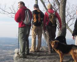 A group admires the view during a winter hike near Knoxville, TN.