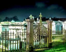 Escape into the darkness with your licensed guide on an air-conditioned bus to some of the most haunted locations in New Orleans outside of the French Quarter. Cross one of the most notorious streets in America as we make our way down scenic Esplanade Avenue telling tales of tragedy, trauma, and mystery which has made us the most haunted city in America. All locations are alive with paranormal activity. Visit real cemeteries at night! Bring your camera, you won&#39;t want to miss this! We have offered this tour for over 4 years now and are amazed by what our guests experience. People capture full-bodies apparitions not only on photographs but see them with the naked eye. People have heard whispers in their ears, felt the touch of someone brushing their cheek or stroking their hair, and sometimes even have a ghost photo bomb their pictures! Keep an open mind - you never know what might happen on this very haunted tour. (we do not disclose which cemetery you will visit-it&#39;s a surprise)