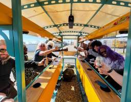 Experience the lively bar scene of Mid-City just minutes beyond the French Quarter with Nola Bike Bar’s Pedal Pub-Crawl. As you climb onto our one-of-a-kind BikeBar with your designated driver, you'll be surrounded by the lively vibe of Mid-City, a neighborhood with a rich heritage and a blossoming craft drink scene. Our expert and welcoming guides will take you to a handpicked collection of local pubs, breweries, and distilleries, where you can sample a range of finely crafted cocktails and brews made right here in New Orleans. There are NO drinks supplied or sold on the BikeBar itself. Purchase drinks from the places the tour stops (don't forget "one for the road!" as you have a designated driver. We visit a number of awesome bars; breweries, distilleries, classic dive and tiki bars. However, selection during your tour may be limited due to private parties, blocked streets or operating hours of some establishments. Other places we visit; Wrong Iron Bayou Beer &amp; Wine Garden