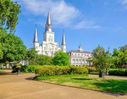 Embark on a tour of the French Quarter and step into a living history book. With the original grid of streets still intact and the beautifully preserved buildings, this iconic New Orleans neighborhood offers a vivid glimpse into the city's rich and colorful past. As you walk with us, jazz and blues serve as the soundtrack, resonating from tucked-away bars, intimate courtyards, and lively street musicians. Our guided tours offer a deep dive into the Quarter's storied history. Wander past the timeless façades with ornate ironwork balconies, and you'll be regaled with tales from when Spanish, French, Creole, and American influences converged to craft this unique enclave. Rich, cultural heritage and sheer aesthetic beauty coupled with intriguing and informative stories that only a local with ancestral ties can give you, this New Orleans History Tour promises a sensory-filled adventure that lingers long after you've left.
