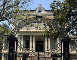 Your exploration begins outside PJs coffeehouse, a local treasure that features beignets. The tour itself focuses on the historic Garden District, lasts two hours and covers about 1.5 miles. Your expert guide will provide a quick overview of Louisiana history before delving into the architectural gems of the neighborhood. Historical context acknowledging the indigenous presence, the slave economy, the patrons of the mansions along with the architects are discussed. Local burial traditions are reflected upon OUTSIDE the gates of the historic Lafayette cemetery. Lastly a few pop culture references and celebrity related addresses are included with a special stop reserved for the Buckner Mansion, known to fans of American Horror Story (AHS) as the Miss Robichaux's Academy for Exceptional Young Ladies. ****Due to the City of New Orleans closing of the Lafayette cemetery for renovations , there will be NO access into the cemetery and an overview will be presented OUTSIDE of the gates.