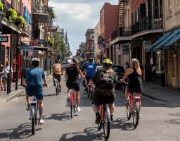 This tour begins with a ride to the famous French Quarter, boasting nearly 300 years of history. Your fully licensed tour guide will take you to popular highlights in "the Quarter" and the Treme, including Jackson Square, St. Louis Cathedral, Congo Square, along with some lesser-known gems, all while telling you fascinating stories about your surroundings. We then pedal to the charming oak-lined Garden District, stopping to admire the lavish historic homes of New Orleans, and talk about some of their most famous occupants. History, architecture, celebrities; this neighborhood has it all! Tour length: Approximately 9 mi. Paved Paradise Tours is a small, owner-operated company that provides a truly local perspective. When you ride with us you are riding with one of the owners, ensuring that your experience is of the highest quality. See the city through the eyes of someone who loves what they do, loves the City of New Orleans, and wants you to love it too.