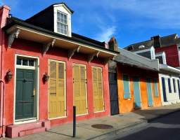 Our most popular 3 hour driving tour is an overview of New Orleans, traveling in the comfort of our luxurious Honda Odyssey minivan. We'll start in the French Quarter, where the city’s colorful history began. We’ll continue to the Marigny and the Bywater, two charming downriver neighborhoods, and get a sense of their changing history through the centuries and in the 14 years since Hurricane Katrina. We’ll proceed up mansion-lined Esplanade Avenue towards Bayou St. John and to City Park, one of our nation’s oldest urban parks and home to the world’s largest stand of mature live oak trees. We will continue upriver along iconic St. Charles Avenue through the University area into the fabled Garden District. Approaching Canal Street, we’ll pass through the Warehouse Arts District, by the World War II Museum and the Central Business District. A condensed presentation, this tour is great for hot summer months, (we’re in air conditioning the whole time!) or for visitors short on time.