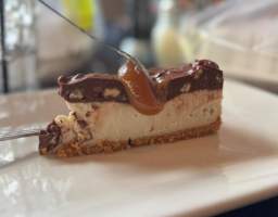 Discover the vibrant vegan food scene in New Orleans on this delightful Vegan French Quarter Food Tour. Perfect for vegans, vegetarians, or the curious foodie, this small-group experience, limited to 9 guests, showcases plant-based NOLA dishes that are off of the typical tourist radar. Enjoy a full meal, not just samples, as you explore locally-owned restaurants redefining Southern cuisine. With a licensed local guide, learn about the cultural significance of the dishes while enjoying one featured vegan beer (no, not all beer is Vegan!) or soda included in the tour. Duration: Approximately 3 hours of delicious exploration. Small group sizes ensure a personalized experience with just 9 guests or fewer. Savor a full vegan meal featuring local favorites and innovative dishes. Enjoy a guided tour highlighting the rich cultural history of New Orleans cuisine.