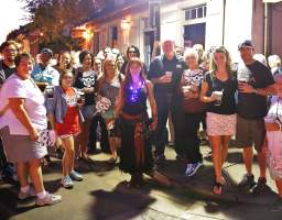 Take a romp through the haunted French Quarter on this famous New Orleans private ghost tour. During your 2-hour evening walking tour, your group will explore the grim and ghastly deeds of New Orleans’ haunted history as you follow your entertaining guide down dark and sinister streets. You’ll learn about infamous events that occurred long ago and be chilled by evidence of phantoms and ghosts that abound! We are the originators of the ghost tour in New Orleans. We have been featured on every major television network worldwide for over 26 years. We are the only company that has a book documenting the original paranormal investigations of the locations on the ghost tour. We are the oldest and largest tour company in New Orleans for over 2 decades. Please arrive at least 20 minutes prior to tour departure.