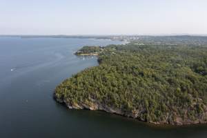 Shores of Lake Champlain in the summer with boats