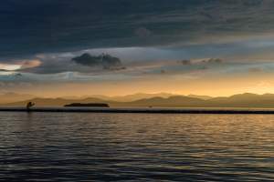 This is a beautiful sunset over looking Lake Champlain along the Burlington Waterfront.