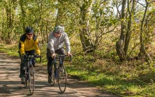 Two people cycling on the Yorkshire Wolds