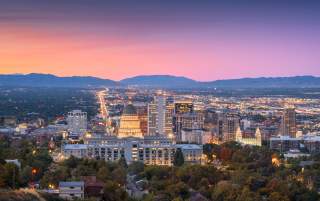 Sunset view of the Salt Lake Valley with the capitol building looking down State street