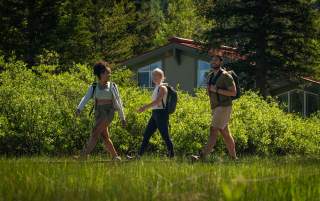 Three friends hiking in Brighton, Utah