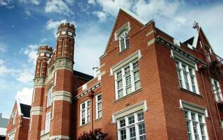 Red brick building with towers - Converse Hall at Westminster College
