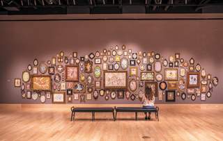 Wall of art in a gallery