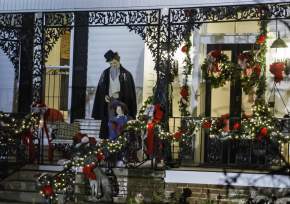 Mr. and Mrs Clause on front porch