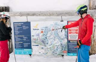 Consulting the ski map at Solitude Mountain Resort