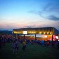 Night Time Shot of Crowd Watching Miranda Lambert Performance at Lakeview Amphitheater with Sunset in Background