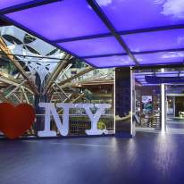 The I Love NY sign at the CNY Welcome Center at Destiny USA