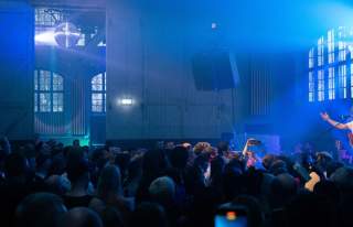 Crowd in dark event room