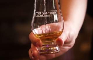Rum being poured into a glass