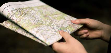 A person holding an OS Map