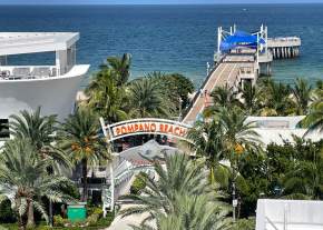 A view of the Fisher Family Pier in Pompano Beach, Florida as seen from Pier 6 Rooftop at the Home2 Suites/Tru by Hilton Pompano Beach Pier.