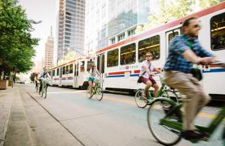 GREENbike Alongside Trax in downtown Salt Lake