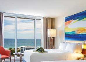 Interior of an oceanfront room with double beds at B Ocean hotel in Fort Lauderdale