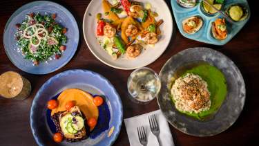 Colorful coastal dining seafood dishes