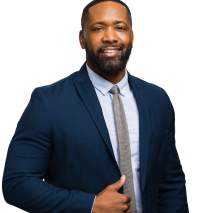 Lem Brown Headshot with city background