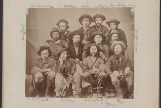 Photograph shows group portrait of former prisoners of war and guides taken upon their arrival at Knoxville, Tennessee, on January 1, 1865.