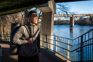 Man walks to Swift Fit Events class near Lady Bird Lake