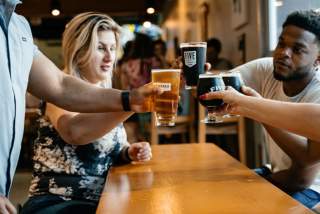 a group of people drinking beer at Metazoa