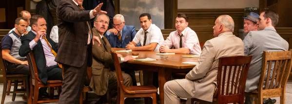 12 men at a table from the Syracuse Stage production of 12 Angry Men