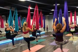 Women doing Aerial Yoga at Good Vibes Yoga Fitness & Wellness in Martinez