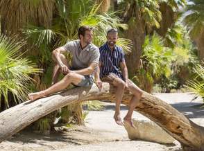 two men on tree in Palm Canyon