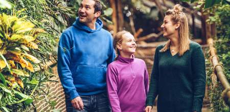 A man, woman and child in Plantasia Tropical Zoo