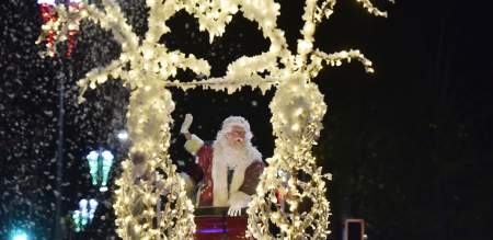 Father Christmas riding his sleigh in the Swansea Christmas Parade