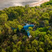 Aerial view of the DC3 WWII wreck on the Kimberley Coast, surrounded by mangroves. Kimberley expedition cruises visit this aircraft wreck on certain itineraries