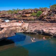 Enjoy a swim in a crystal-clear freshwater oasis after a scenic hike.