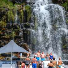 Experience a refreshing waterfall shower right from your Kimberley cruise.
