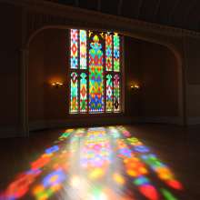 Colorful stained glass reflection inside Louisiana's Old State Capitol