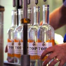 Top of the Hill Distillery filling bottles.jpg