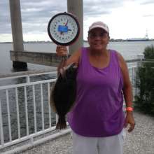Eileen Urrutia with 2 lb., 9 oz. flounder