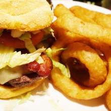 burger and onion rings at Johnny's Big Burger
