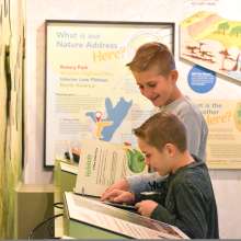 children read at exhibit