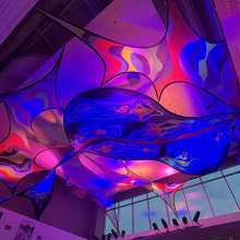 lighted multimedia art installation in a ceiling