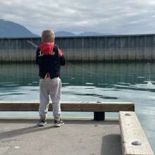 young boy fishing Haines boat habor dock