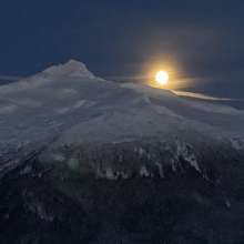 Moon coming up on Santa Claus Mountain