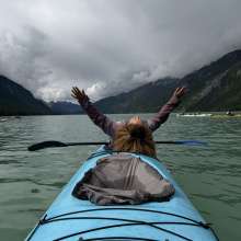 women on a kayak tour excited the sun is shinning