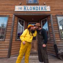 Beer Cheers couple in front of the Klondike during beerfest